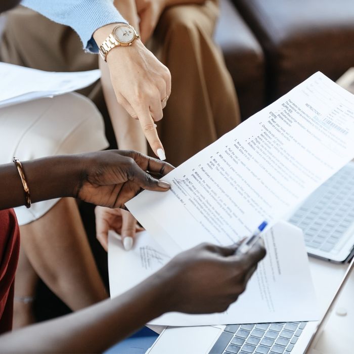 People reviewing paperwork together